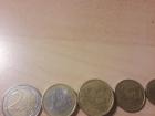 Pictured are euro coins for 2 euros, 1 euro, 50 cents, and 20 cents