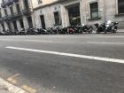 A long string of mopeds lined this street -- a very popular way to get around Barcelona