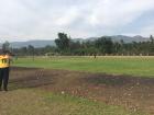 A soccer field located outside of town