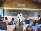 A Gorilla Doctor teaches the kids about wildlife