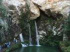 Waterfall under a capilla (chapel) built into the mountain