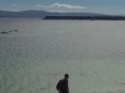 Standing on a rocky beach in Fisterra