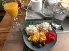 Breakfast: fresh farm eggs, bread from the local bakery, tomato and olives