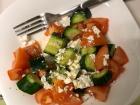 A common Balkan salad made with cucumbers, tomatoes and shredded white cheese... salty and delicious!