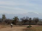 The High Atlas Mountains overlook small Tameslouht from the distance