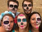 We got our faces painted as Catrinas, which are decorated skeleton caricatures typically seen around Dia de Muertos.  