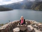 Sitting in a stone kettle looking over Cuicocha, a volcanic lake in northern Ecuador