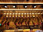 The ham legs hang from the ceilings of many restaurants in Spain.