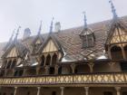 Hospice of Beaune - notice the intricate tiled roofs and the architecture dating back to the Middle Ages