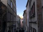 In the older parts of the city, the roads are cobble stone and thin, so only people and small cars can pass through them