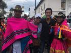 My friend and I posing with some dancers in traditional clothing during a break in the parade