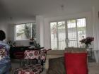 The living room, dining room, and kitchen on the first floor