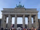 The Brandenburg Gate is topped with a statue of the goddess Victoria in a chariot drawn by horses