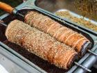 Kürtőskalács are a delicious street food in Romania that are also called chimney cakes because of their shape.