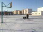 Students making a snowman 