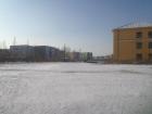 Next to Khovd School Number One (the Yellow Building)