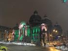The Old Town in Bucharest has many Art Nouveau buildings like the national bank, lit up in green for Christmas time.