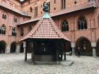 Kelly in the courtyard of the oldest part of Malbork Castle.