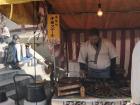 Vendors at a small temple shop during Hatsumōde in Hofu, Japan