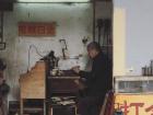 This man is a goldsmith, and this is his shop