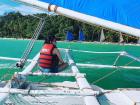 Sailing on a type of local boat called a "paraw"