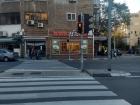 A crosswalk with crossing signals