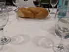 Challah bread is cut up and offered to everyone before dinner begins