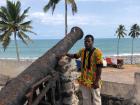 The Elmina Castle tour guide explains the use of cannons in castle protection