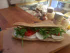 A typical sandwich at Fres&Co: mozzarella, tomatoes, and arugula 