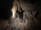 This is a stalagtite which means that rock is hanging from the ceiling of the cave