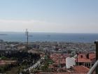 Taken from a Castle overlooking the city, you can see the multiple freighters arriving to the seaport