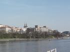 The river splitting the Prague Castle from the city. You can see the top of the Cathedral in the distance