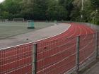 A university football field and running track. The students use it when playing team sports