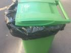 The bins here are bright green! The lid says “Paris Cleaning”.