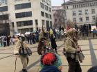 Kukeri dancers performing a skit