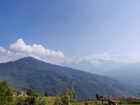 White-capped mountains peeking through the clouds