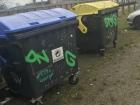 A bin for cardboard and another for paper