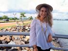 Trying on a traditional Panamanian hat and jewelry 
