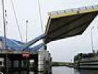 Two arms are raising the bridge