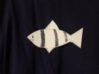 Fish taped to the back of a t-shirt