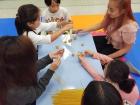 Future engineers building a pasta tower