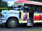 A Samoan bus waits for passengers to board