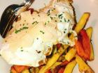 Huevos Rotos: fried eggs on top of sweet potatoes 