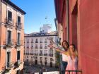 My roommate Allegra and I waving goodbye from our balcony