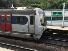 A train on the way to Hung Hom arriving