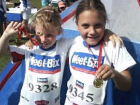 Kate and her bother at Weetbix triathlon