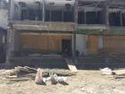 Workers taking a break from building new homes