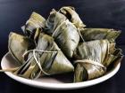 Zongzi are triangle-shaped sticky rice snacks that are heated up by steaming