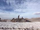 The Tres Marias salt flat, with three figures made of salt