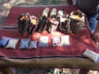 A table of local herbs and corn that the Atacameno people typically eat